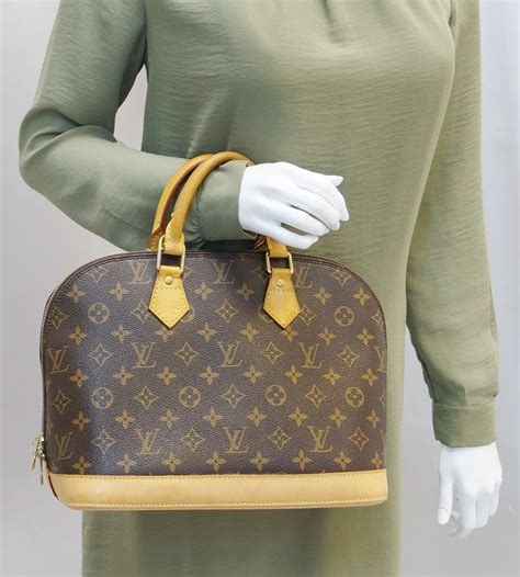 louis vuitton alma monogram bag